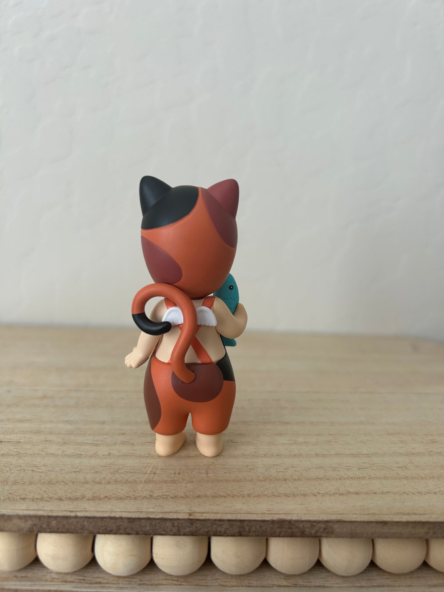 Cat holding Fish